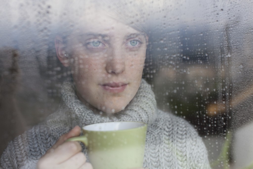 Woman and Rain - iStock_000021880389_Medium