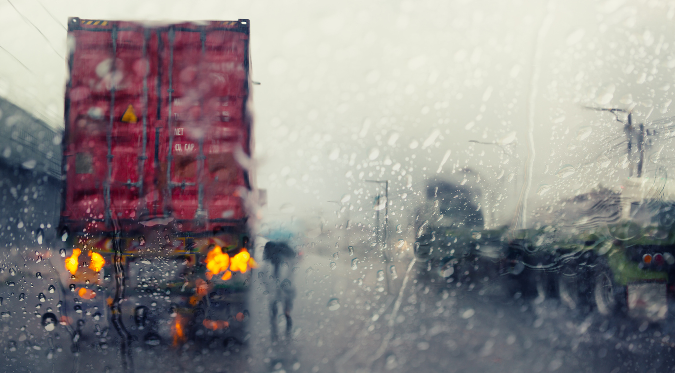 Rainy image of a steel container in transit